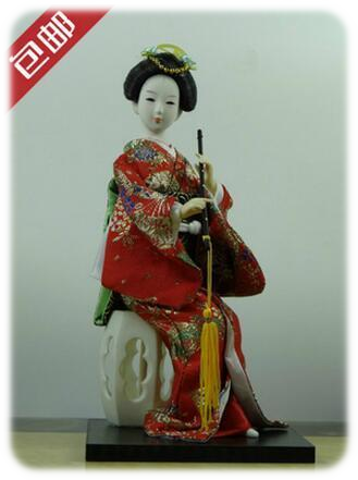 Red Doll Sitting Holdiing Flute